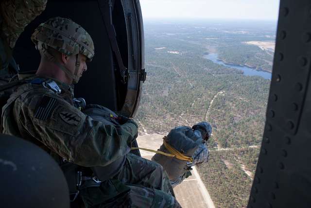 U.S. Army paratroopers jump out of a UH-60 Black Hawk - PICRYL Public ...