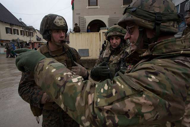 A U.S. Marine of the Georgian Liaison Team, left, and - NARA & DVIDS ...