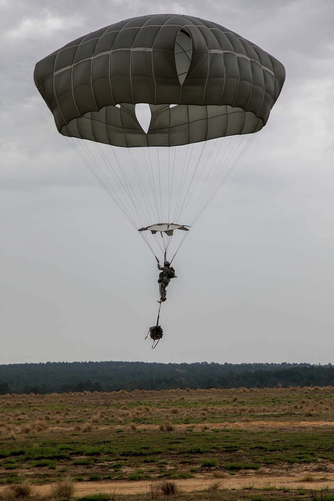 A U.S. Army paratrooper descends onto Sicily Drop Zone - NARA & DVIDS ...