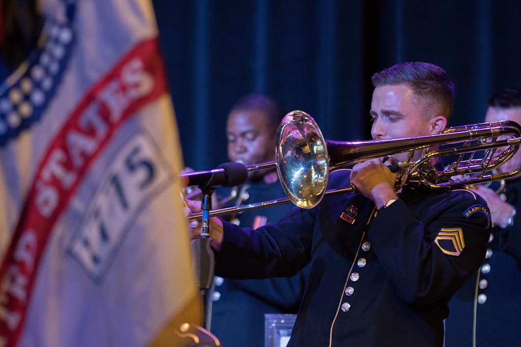 Staff Sgt. Sean Casey, trombone, solos during the song - NARA