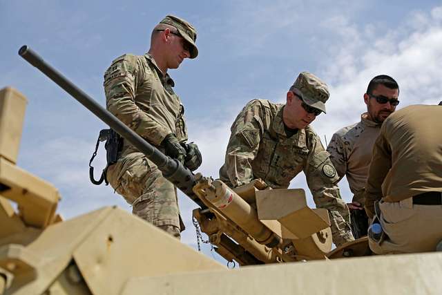 U.S. Army Lt. Gen. Sean MacFarland, center, commander - PICRYL Public ...