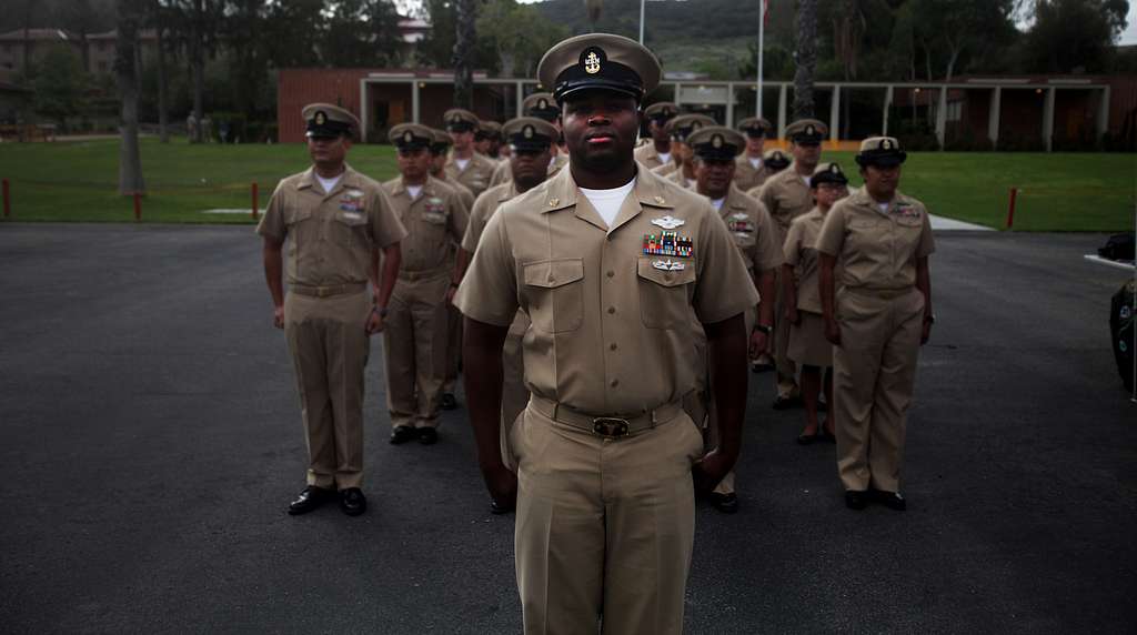 U.S. Navy Chief Petty Officer Mario Lyons stands at - NARA & DVIDS ...