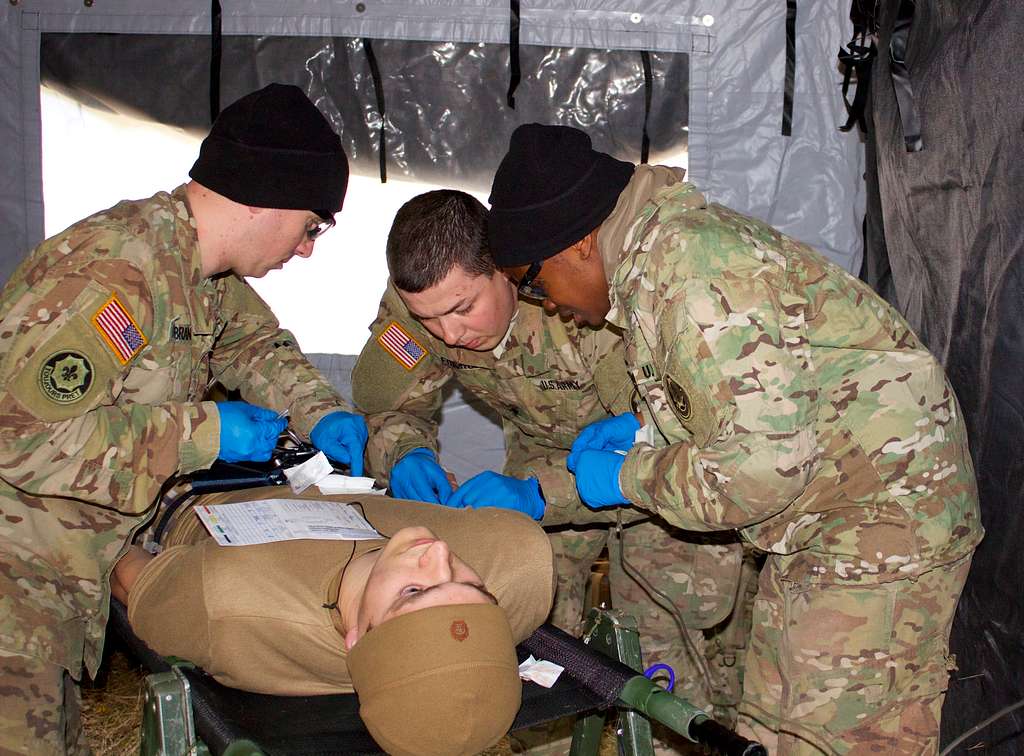 (From left to right) Sgt. Chris D. Hildebrandt, Spc. - NARA & DVIDS ...