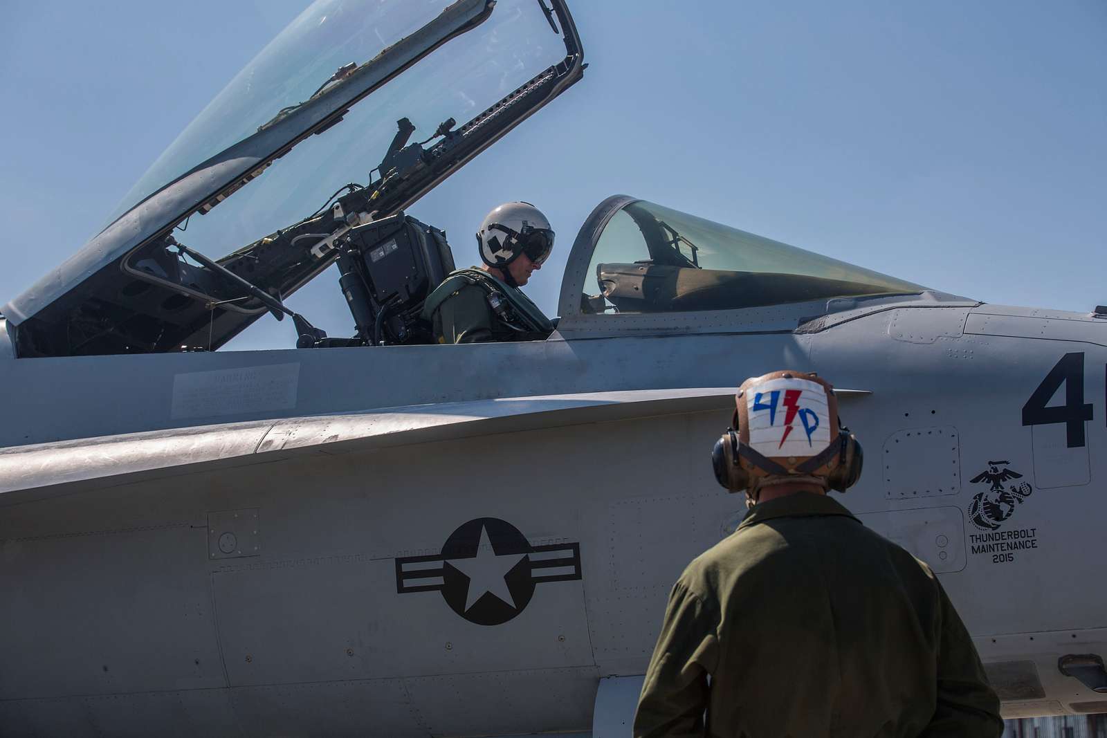 A pilot prepares an F/A-18C Hornet to take off from - NARA & DVIDS ...