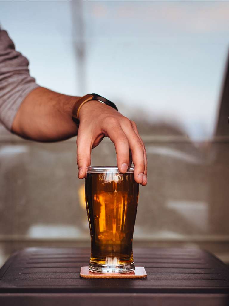 A close up of a glass of beer on a table. Beer peroni glass. - PICRYL -  Public Domain Media Search Engine Public Domain Image