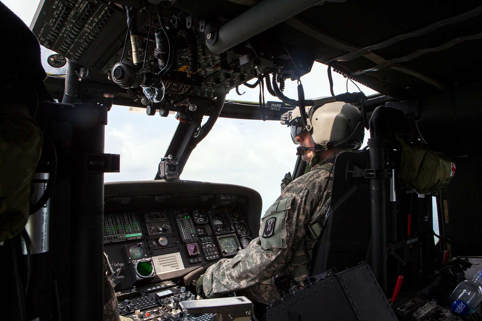 A U.S. Army UH-60 Black Hawk pilot flies for an airborne - NARA & DVIDS ...