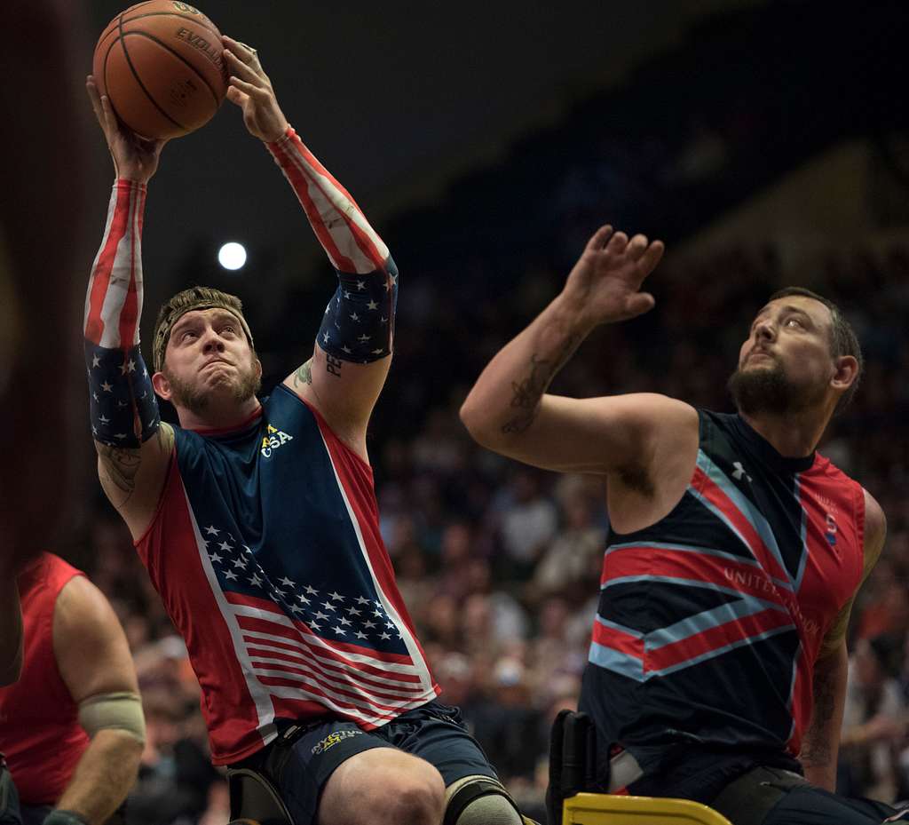 160512-F-WU507-023: 'I AM' cheerleaders dance before Team US and Team UK  face off for the wheelchair basketball Gold Medal during the 2016 Invictus  Games, at the ESPN Wide World of Sports complex