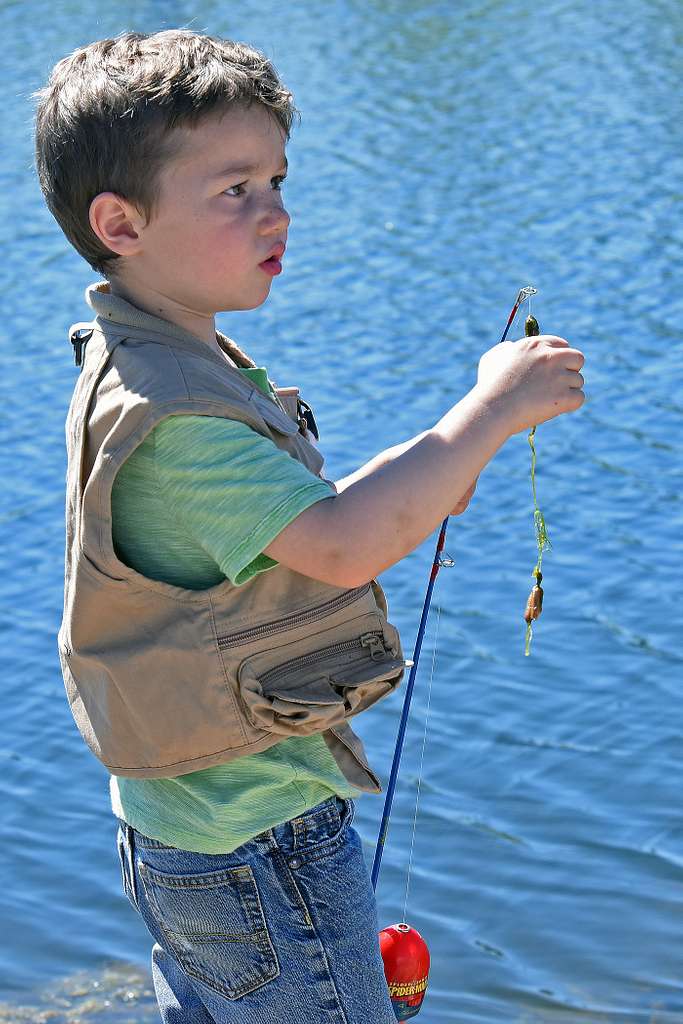 J.D. readies his fishing pole during Kid's Fishing - PICRYL - Public Domain  Media Search Engine Public Domain Search