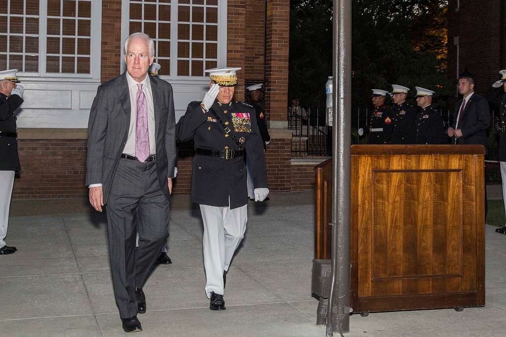 U.S. Sen. for Texas, the Honorable John Cornyn, and his wife, Sandy Cornyn,  pose for a photo with guests during a reception prior to the evening parade  at Marine Barracks Washington, Washington