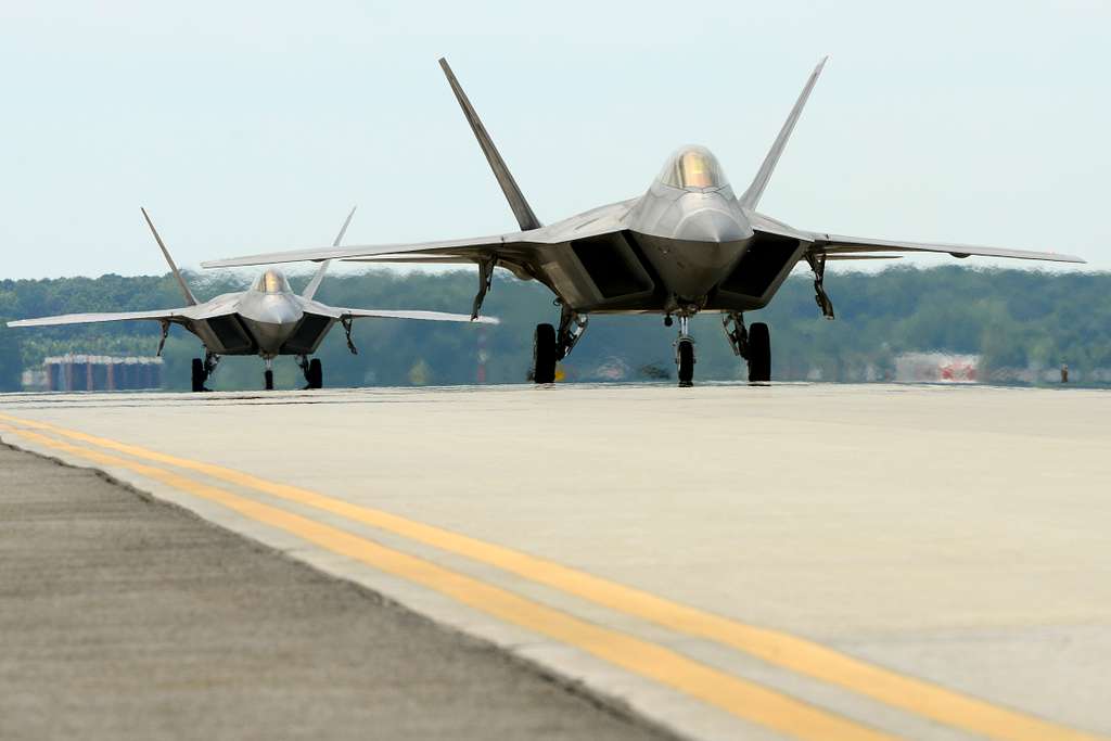 Two U.S. Air Force F-22 Raptors taxi on the flight - NARA & DVIDS ...