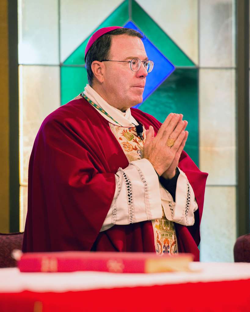 Bishop Neal Buckon Conducts Prayer During The Catholic - NARA & DVIDS ...