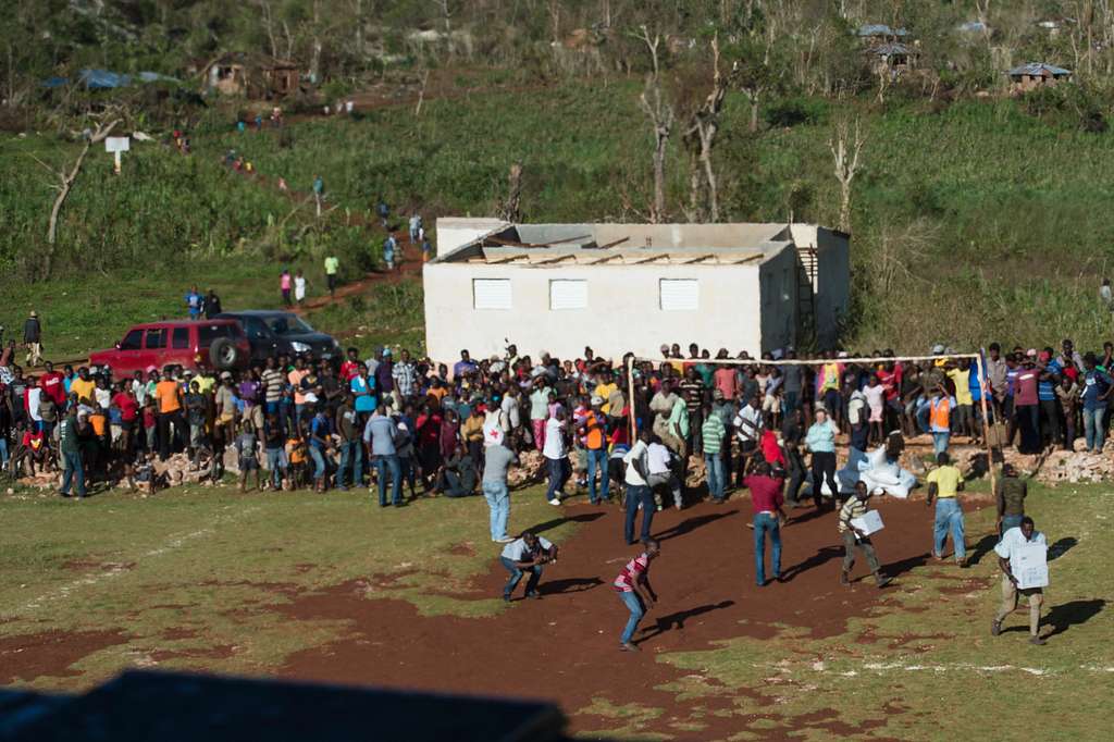 Citizens of Beaumont Haiti gather supplies delivered NARA