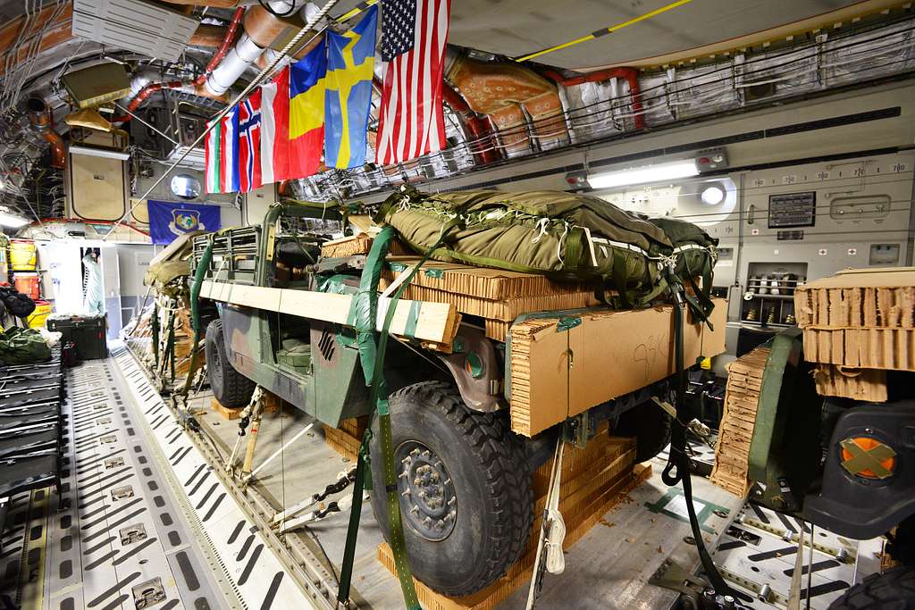 Two M1097 Humvees and Two M119 Howitzers, assigned - PICRYL Public ...