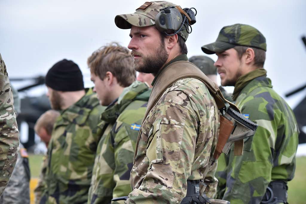 A British soldier, center, listens to a safety briefing - NARA & DVIDS ...