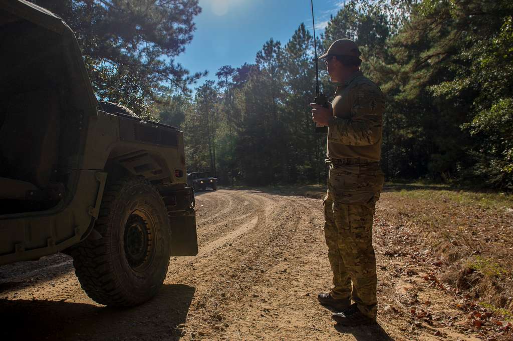 Members from the 17th Special Tactics Squadron, Fort Beinning, GA, teach  civilians how to don special tactics equipment before the Arizona Cardinals  Salute to Service game, Nov. 18, 2018, at the State