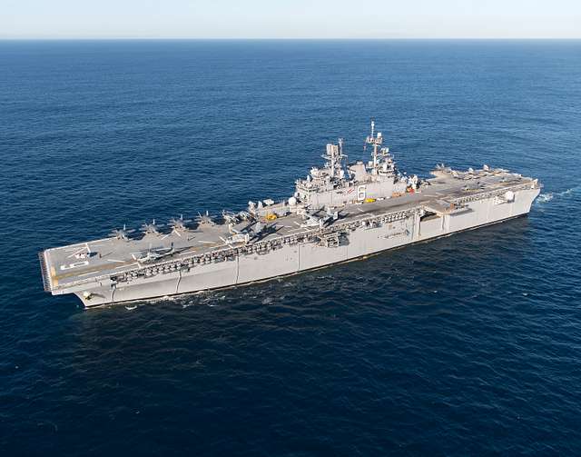 Overall view of USS America (LHA-6) with loaded deck of F-35Bs, MV-22s ...