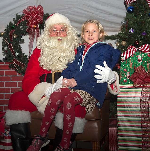 Santa sits with Anna Livingood-Fry, age 7, daughter - PICRYL Public ...