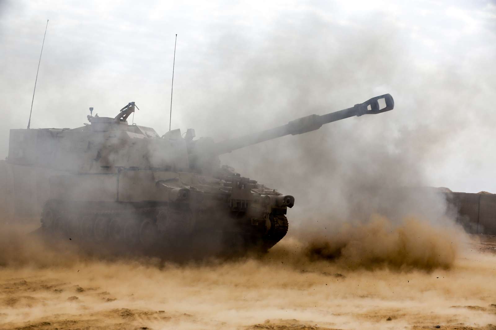 A U.S. Army M109A6 Paladin howitzer conducts a fire - NARA & DVIDS ...