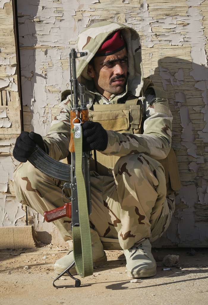 An Iraqi soldier from 7th Iraqi Army Division takes - NARA & DVIDS ...