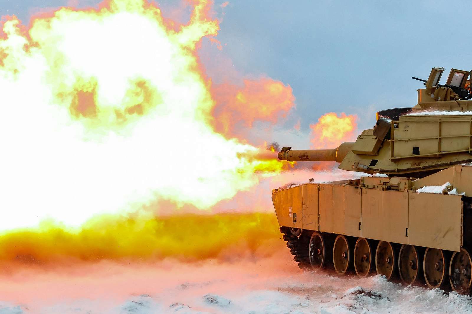 A round is fired from an M1A2 Main Battle Tank belonging - NARA & DVIDS ...