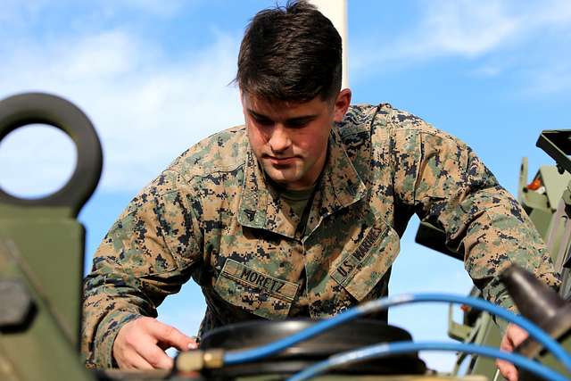 Cpl. Jimmy Moretz inspects the engine of an MK28 extended - PICRYL ...