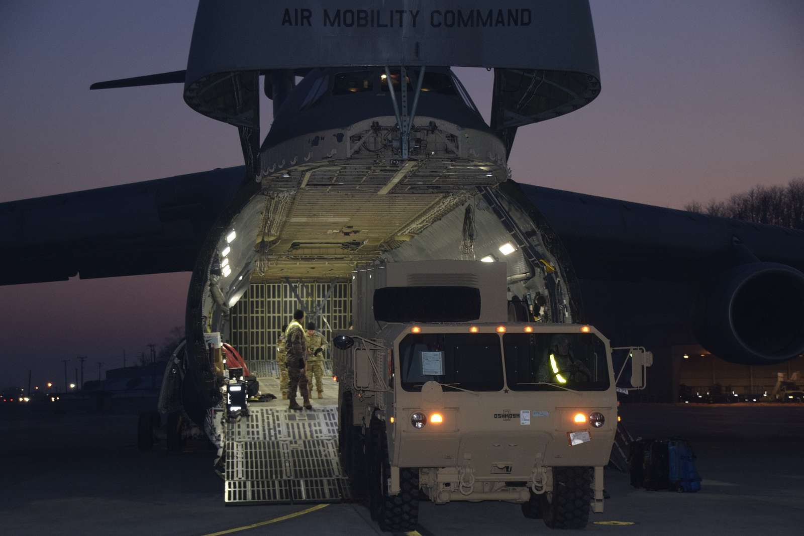 A Heavy Expanded Mobility Tactical Truck Pulls An Electrical - NARA ...