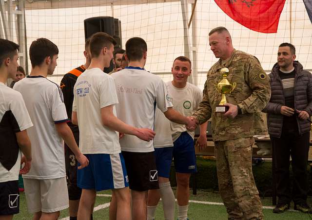 North Carolina U.S. Rep. David Price, and his wife Lisa, speak with  Soldiers of Multinational Battle Group-East during a visit to Camp  Bondsteel, Kosovo, Feb. 19. Members of congress were visiting on