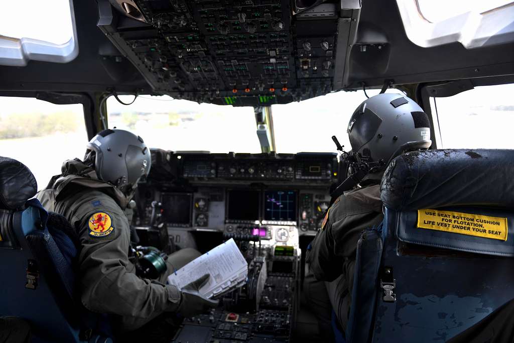 Capt. Manny Buelina, left, and Major Chris De Winnie, - NARA & DVIDS ...