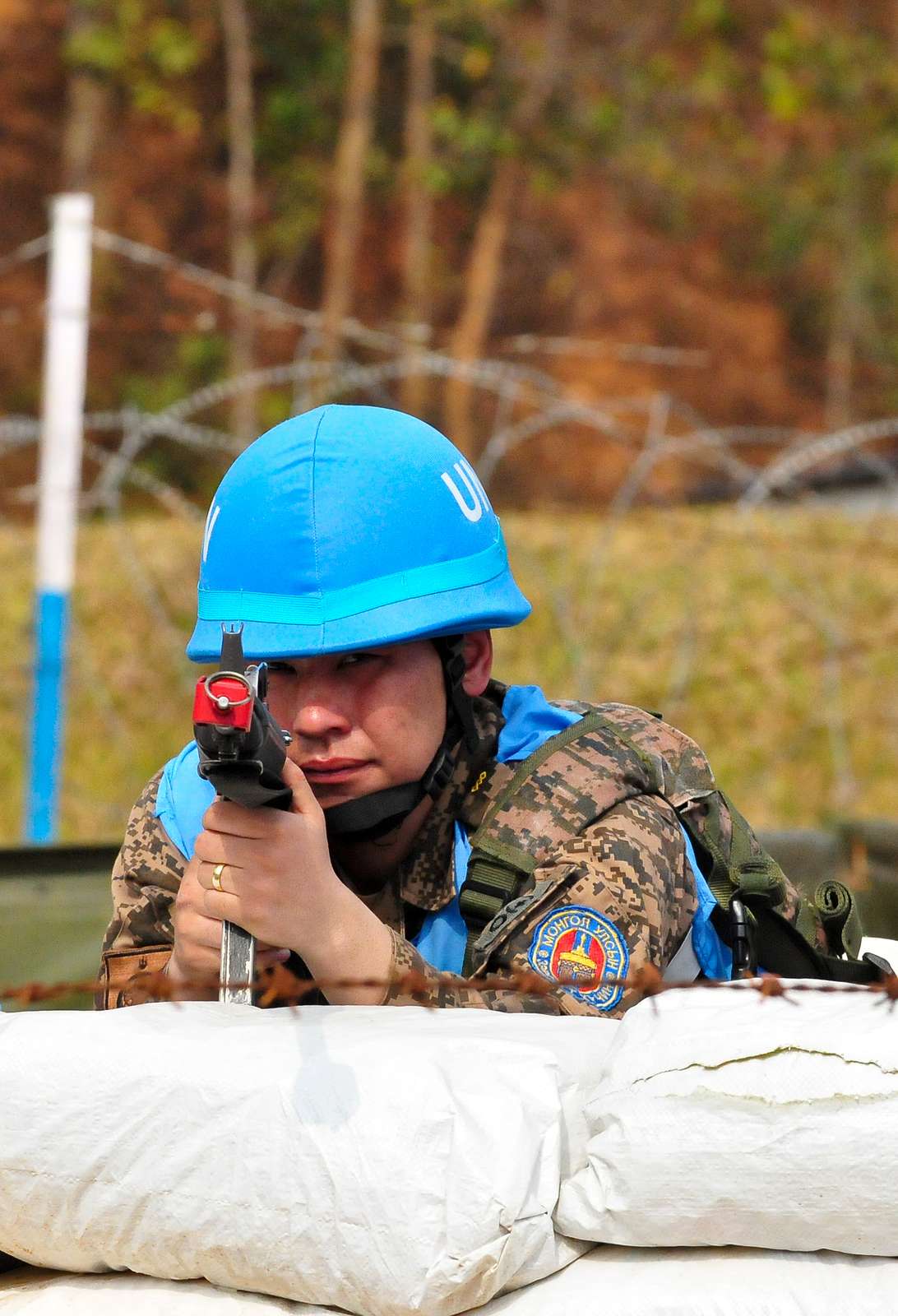 A Mongolian soldier scans his sector during camp defense - NARA & DVIDS ...