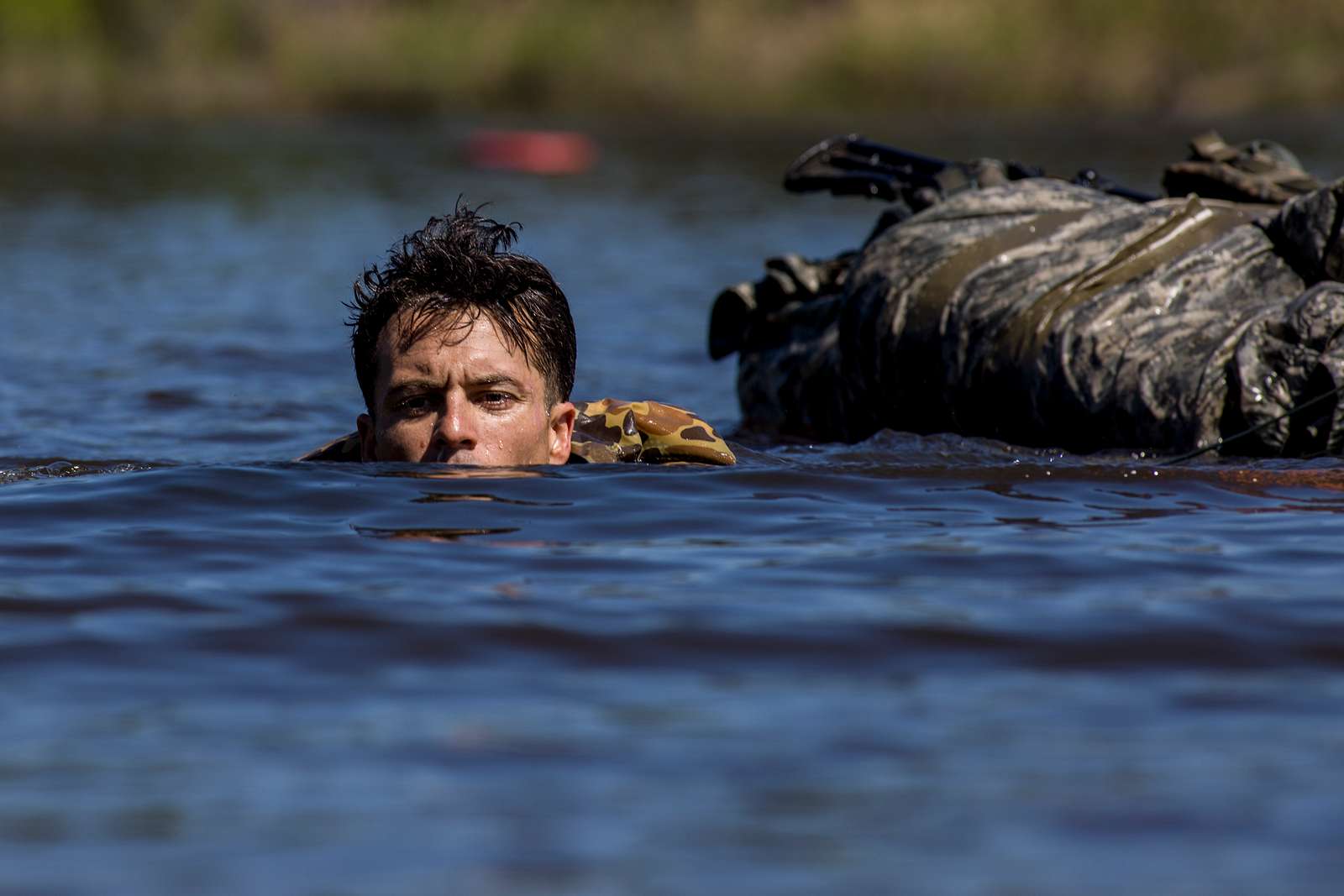 A U.S. Army Ranger swims ashore to perform the Combat - NARA & DVIDS ...