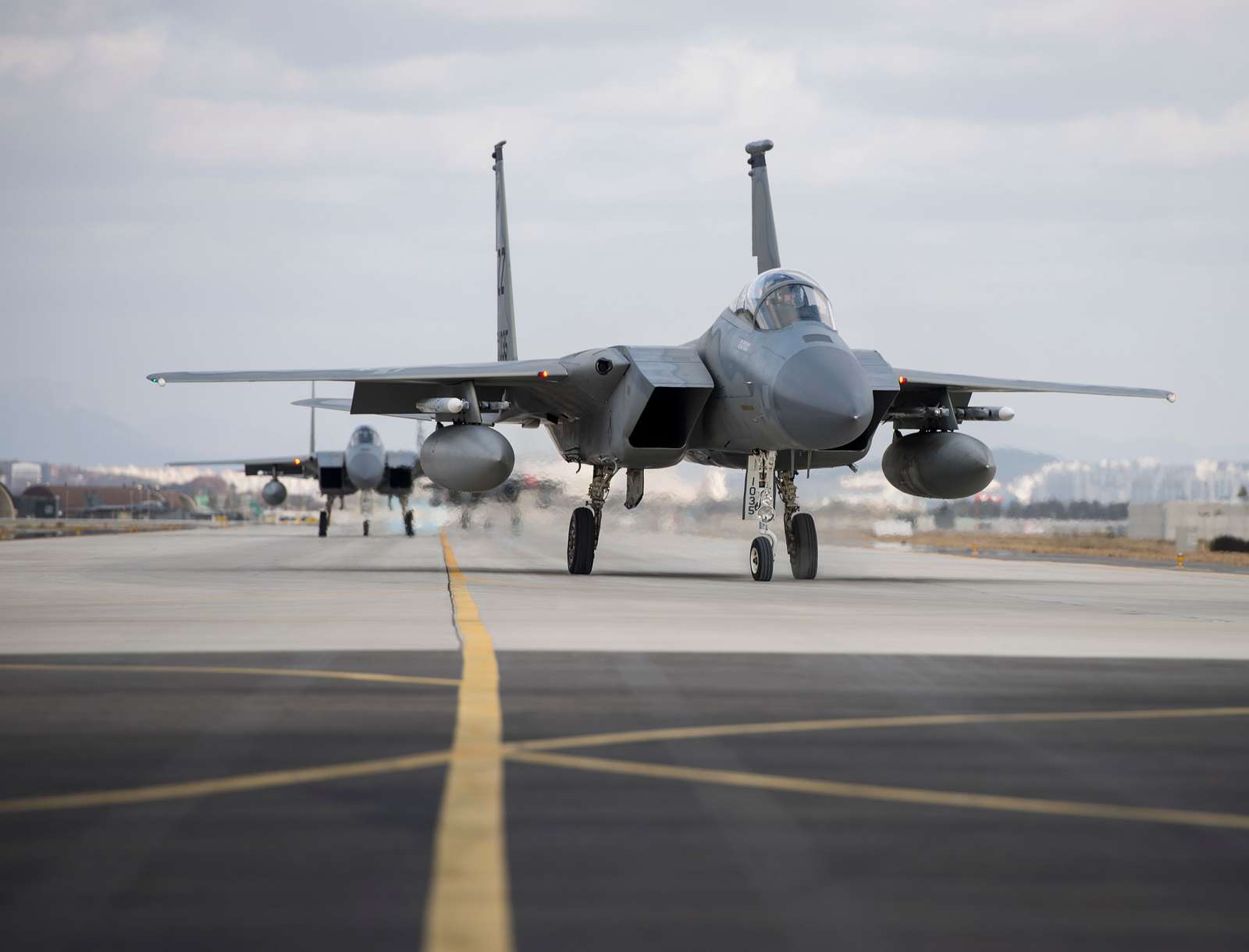 F-15s from Kadena Air Base, Japan, taxi for takeoff - NARA & DVIDS ...