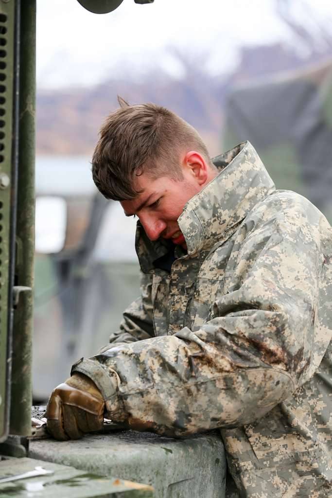 Alaska Guardsman Spc. Brodie Smith a wheeled vehicle PICRYL