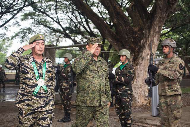 A Philippine and U.S. service members salute Philippine - NARA & DVIDS ...