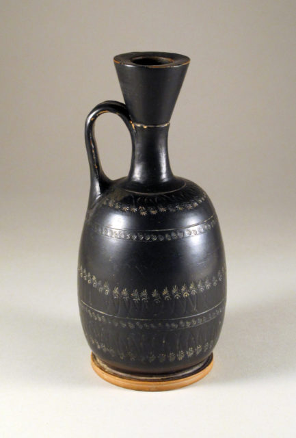 Terracotta guttus (flask with handle and vertical spout)