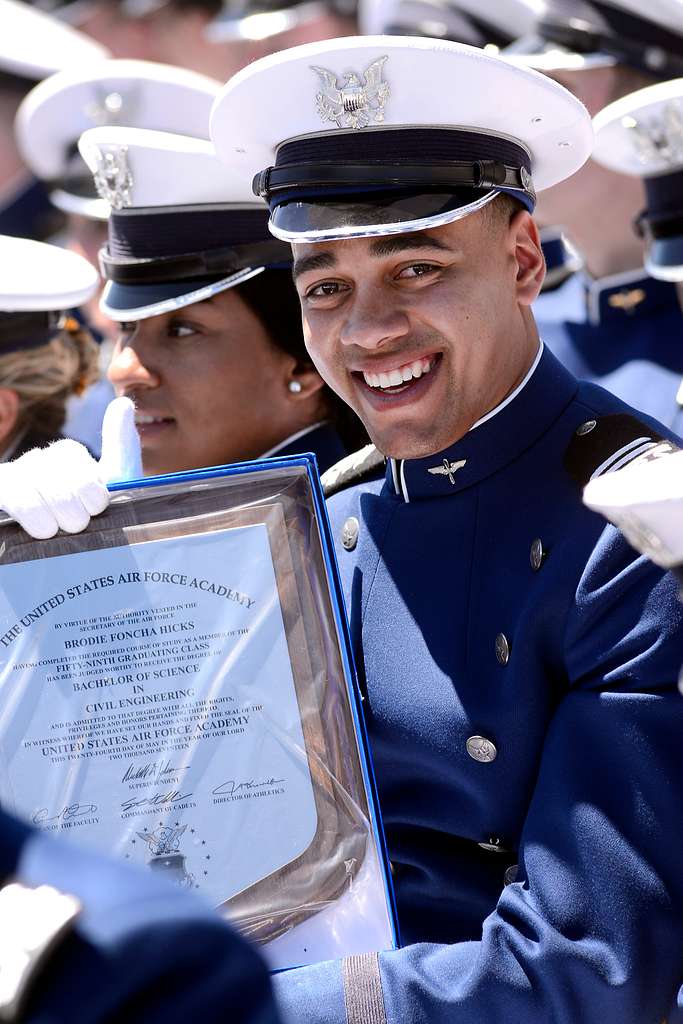 Cadet 1st Class Brodie Hicks show off his diploma during PICRYL