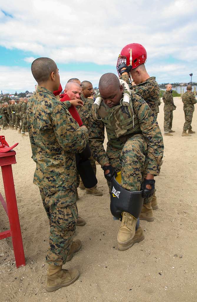 A recruit from Mike Company, 3rd Recruit Training Battalion, applies a choke  hold during a Marine Corps Martial Arts Program test at Marine Corps  Recruit Depot San Diego, July 20. The recruits