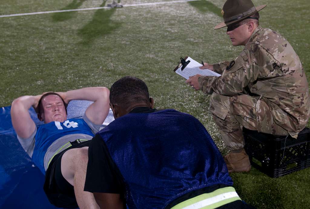 A Warrior is graded during the sit up event as part PICRYL