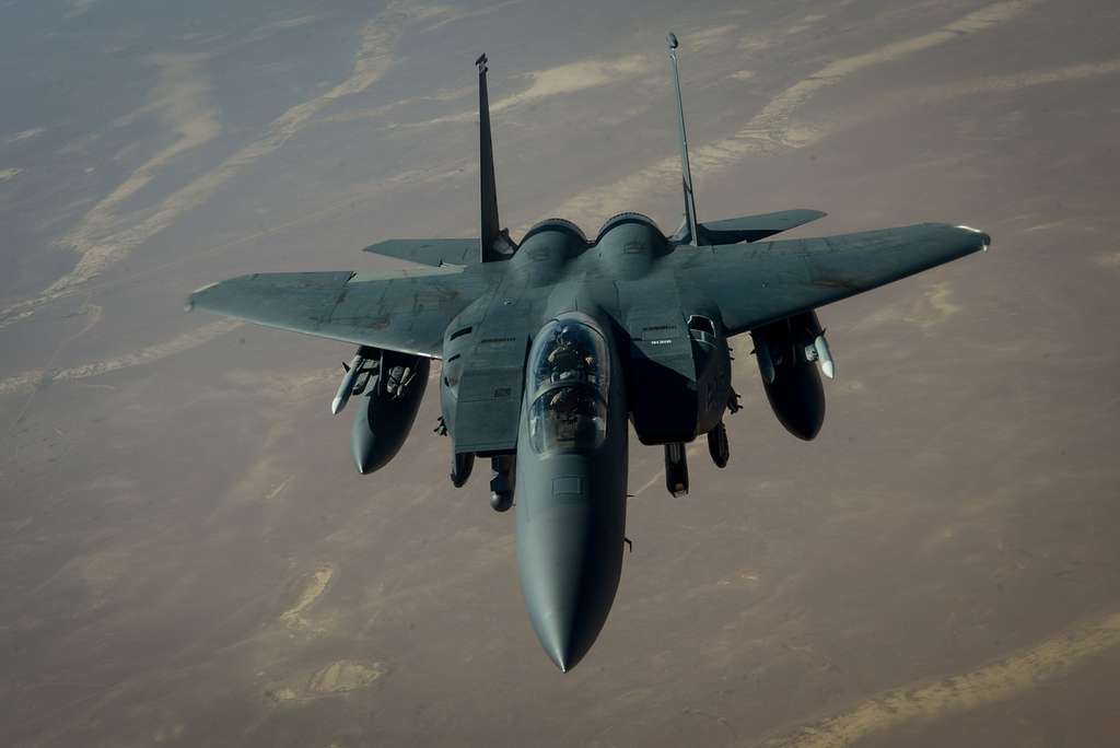 A U.S. Air Force F-15E Strike Eagle departs after receiving - PICRYL ...