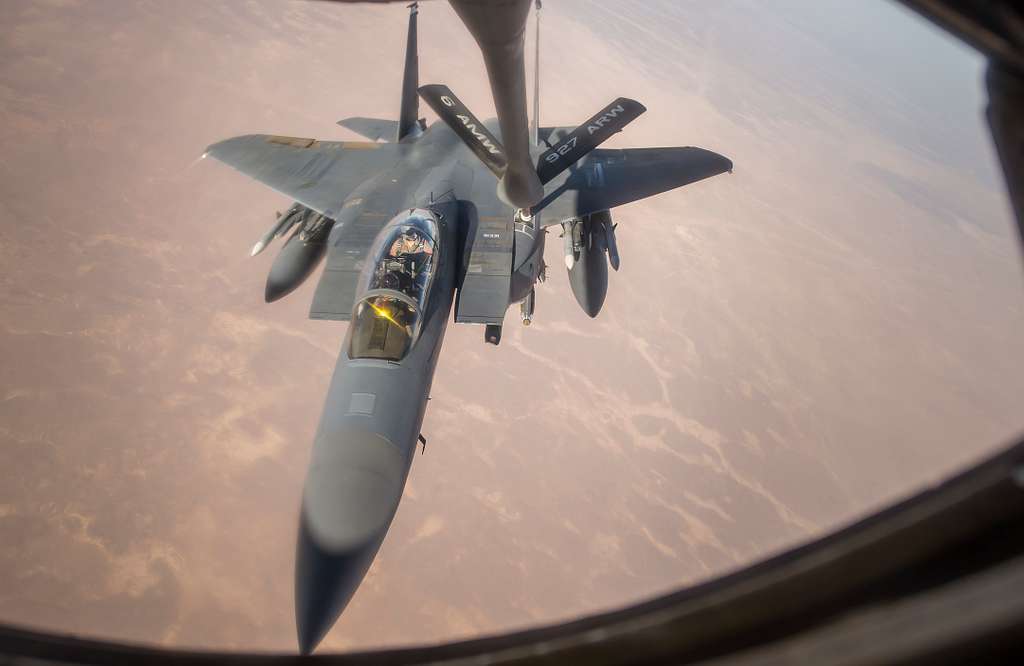 A U.S. Air Force F-15E Strike Eagle receives fuel from - PICRYL ...