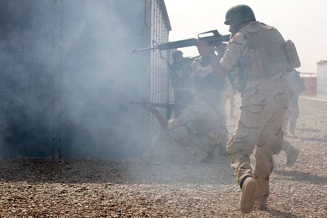 Iraqi army soldiers use smoke for concealment during - PICRYL - Public ...