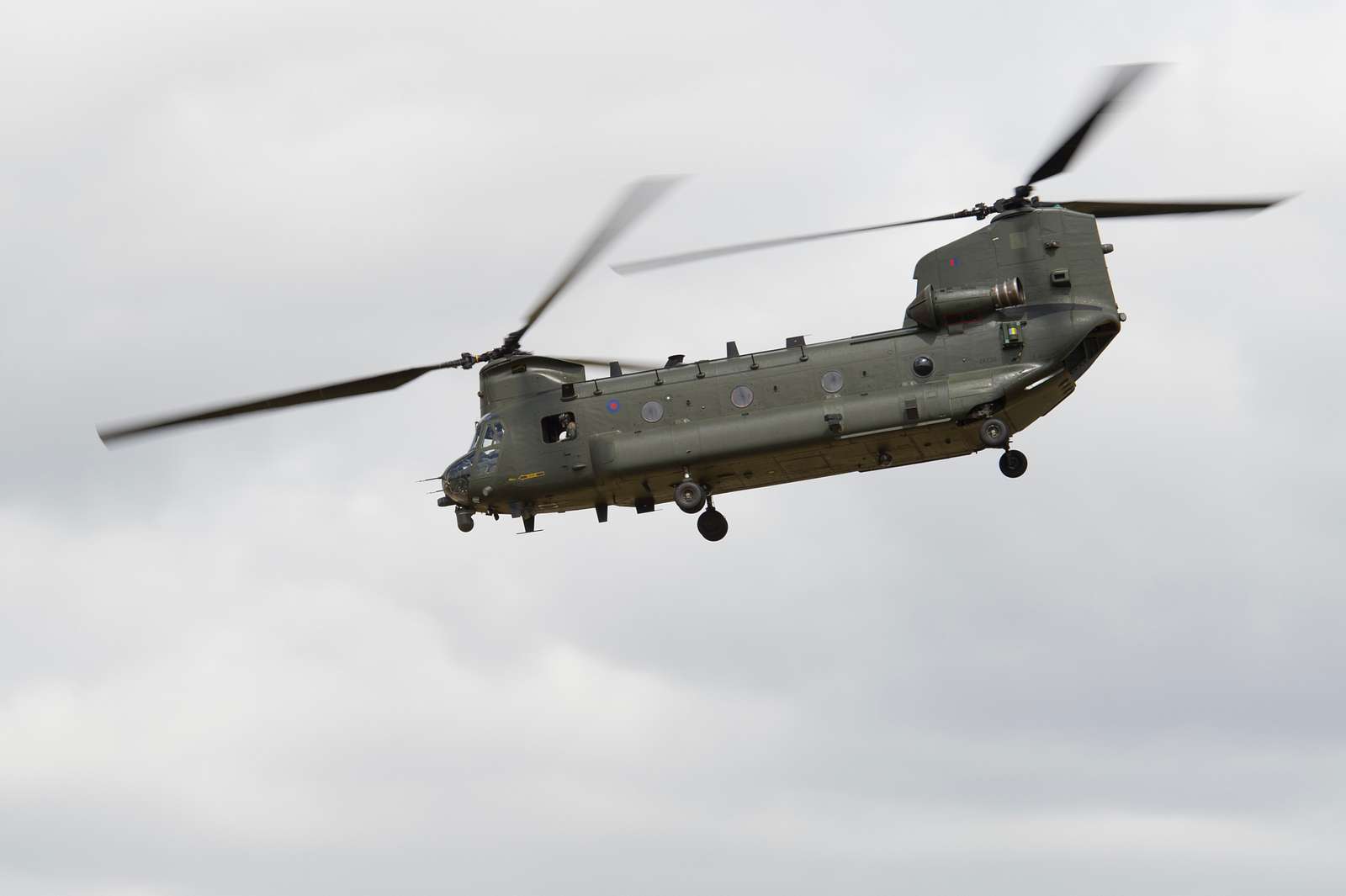 A Boeing CH-47 Chinook helicopter flies over the Royal - NARA & DVIDS ...