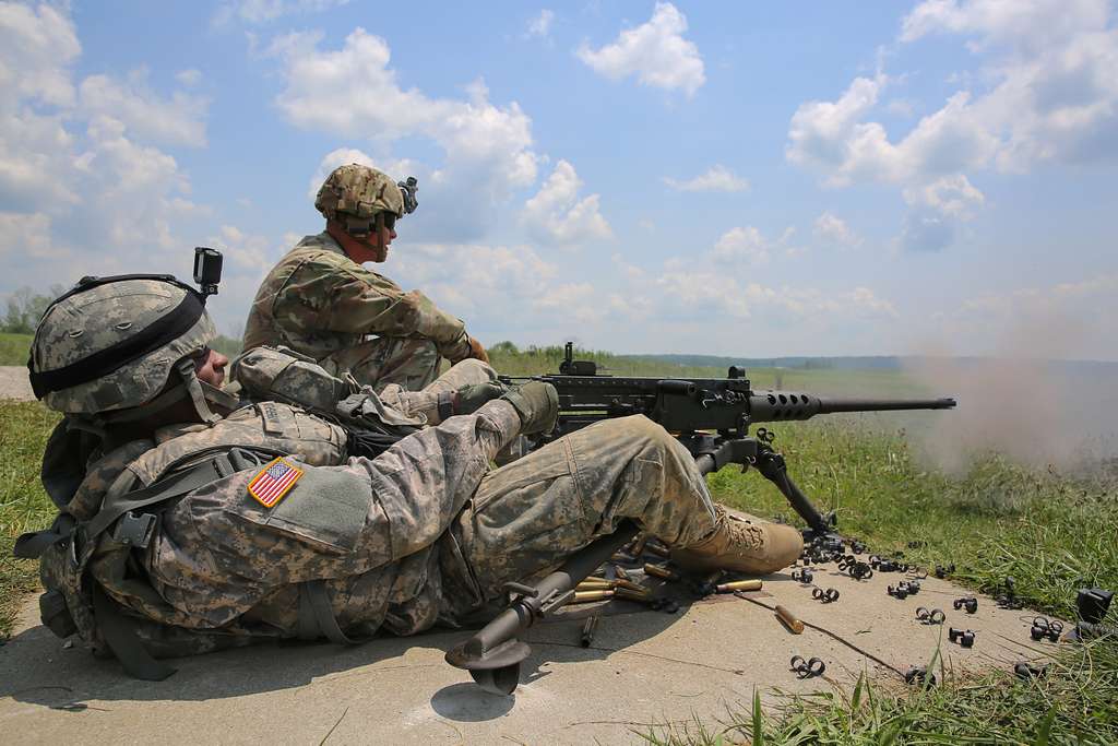 U.S. Army Sgt. Luther Witherspoon fires an M2 .50 caliber - NARA ...