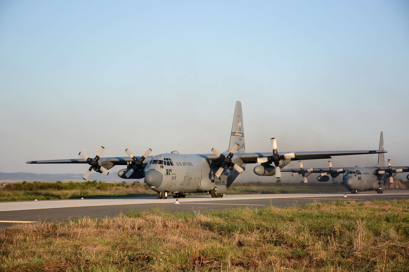 A C-130 driving down the taxiway at Bezmer Air Base - NARA & DVIDS ...