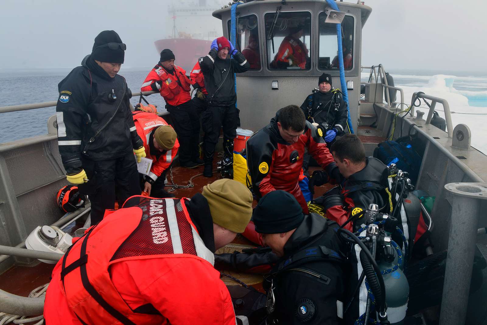 A joint Coast Guard-Navy dive team, deployed to the - NARA & DVIDS ...