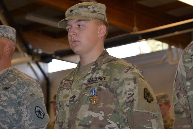 Spc. Austin Day displays the Army Achievement Medal - NARA & DVIDS ...