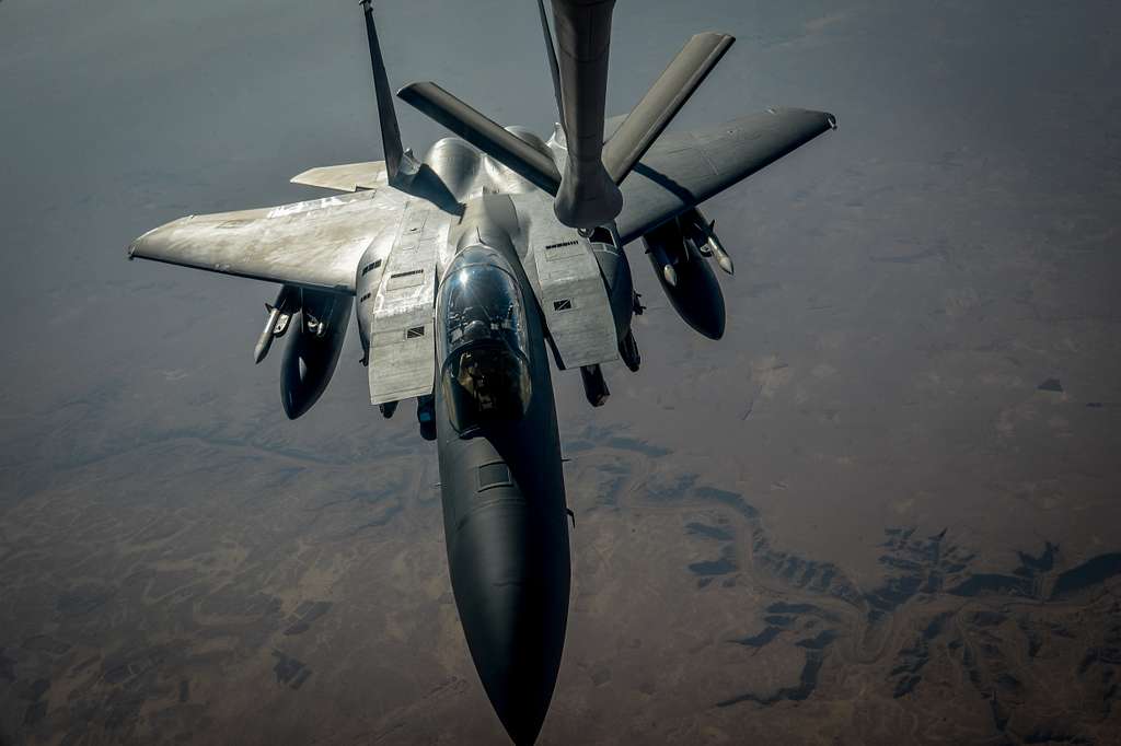 A U.S. Air Force F-15E Strike Eagle receives fuel from - PICRYL ...