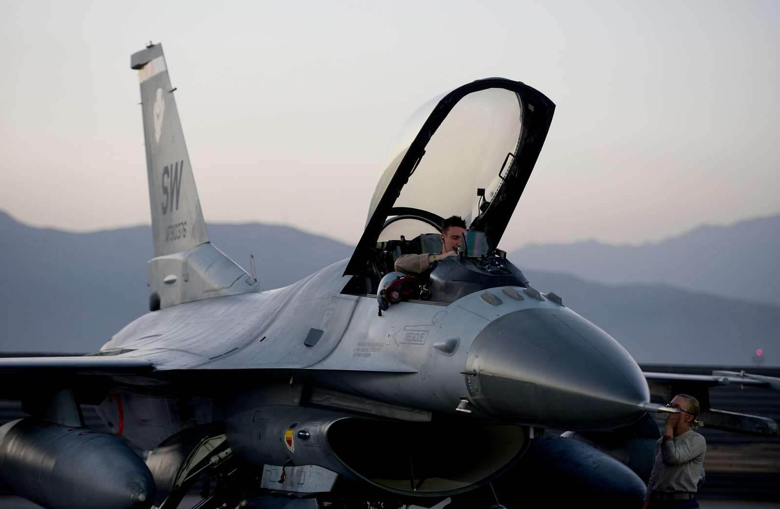 An F-16 Fighting Falcon Pilot, From The 77th Expeditionary - NARA ...