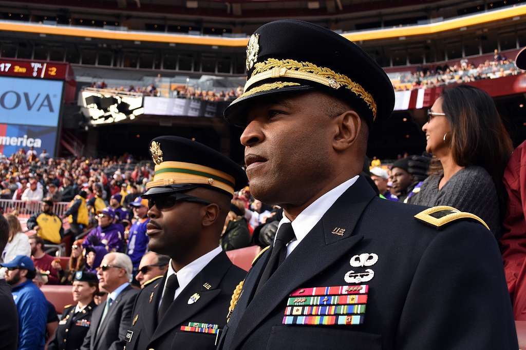 U.S. Air Force recruits are sworn in during halftime on Salute to