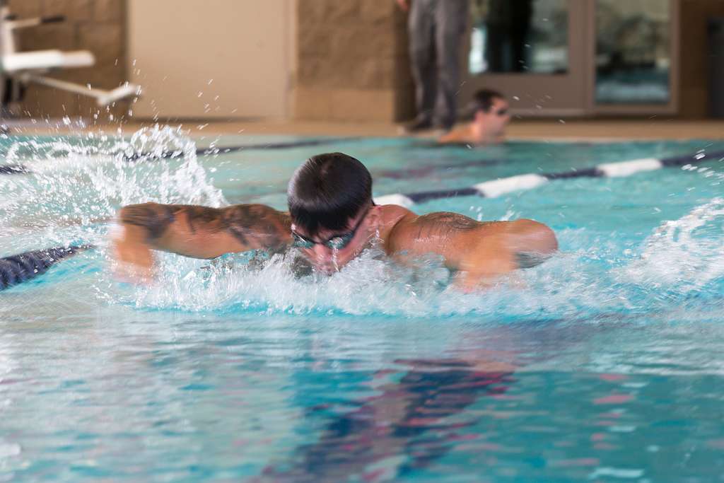 Frouke Beeksma, an athlete of the Royals Swimming Team at the Queens  University of Charlotte, participates in Marine Corps water survival  training during United States Marine Corps' 2018 Marine Week in Charlotte