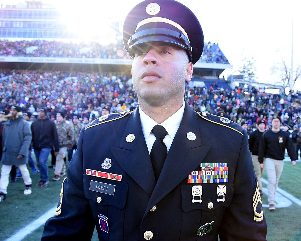 Brig. Gen. Kevin Vereen, deputy commanding general operations for U.S. Army  Recruiting Command, gives the Oath of Enlistment Nov. 12 to nearly 100  Future Soldiers during halftime of the Washington Redskins' Salute